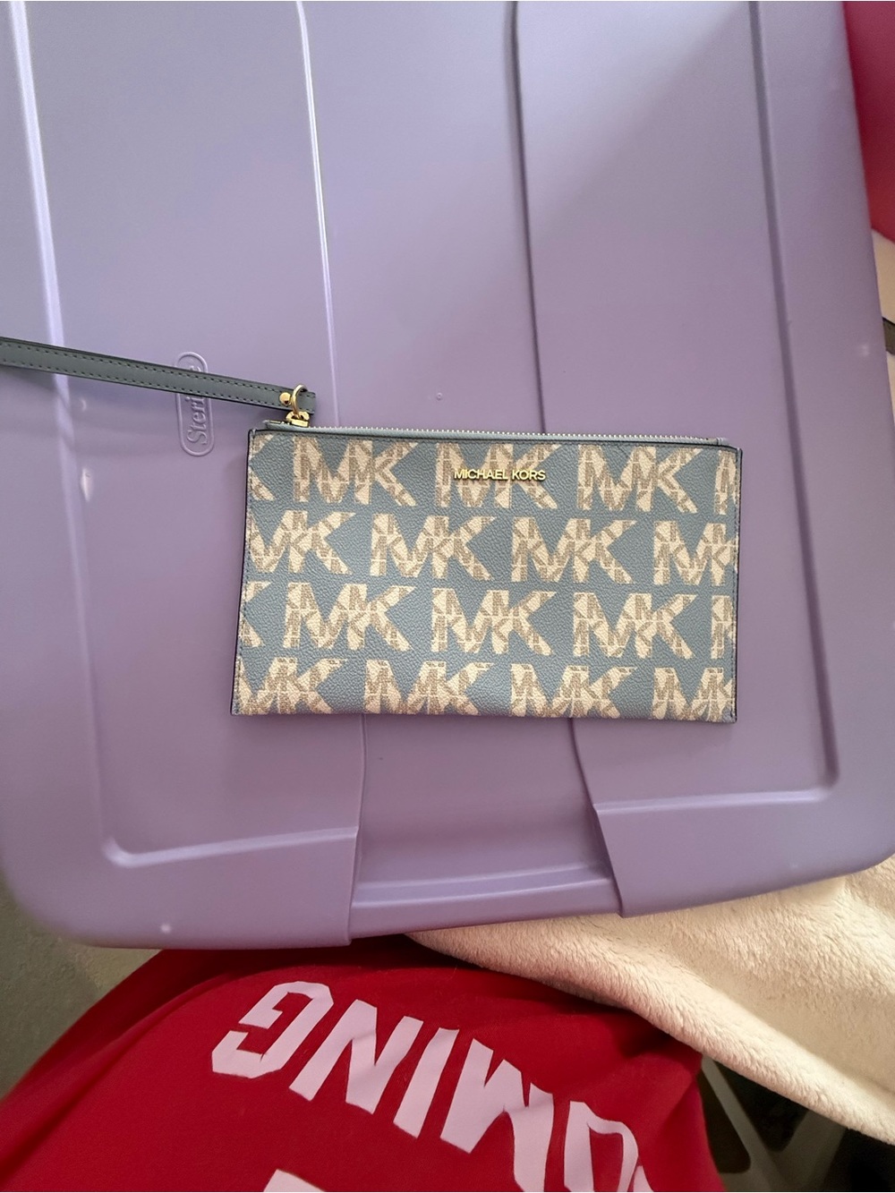 Michael Kors Monogram Zip Wristlet in Light Blue and Cream